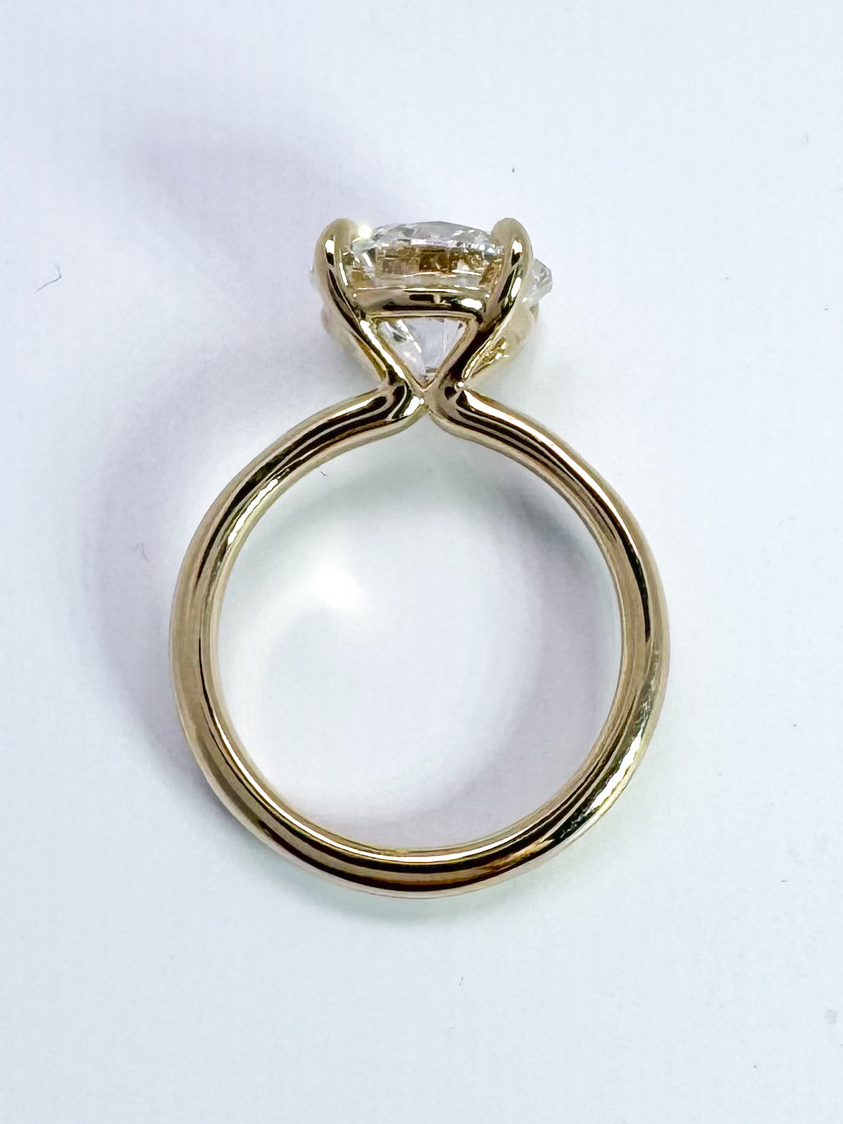 14K, Yellow gold, 5.01 F VS2 ideal cut set in solitaire. IGI Certified