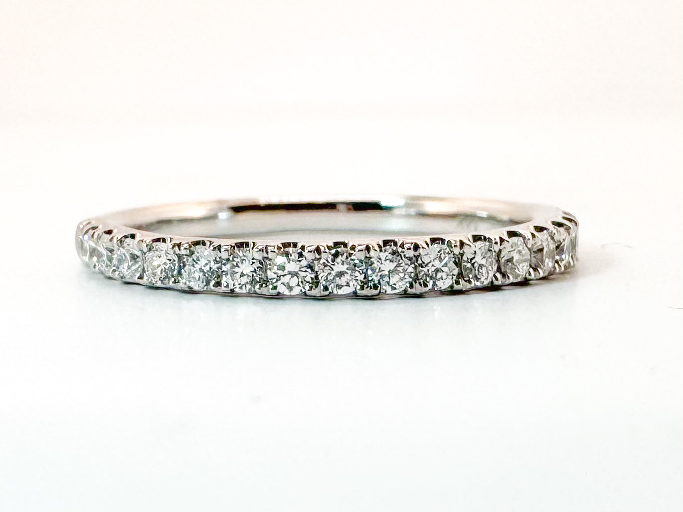 14K, White gold .35 diamond totsal weight wedding band. VS2 G