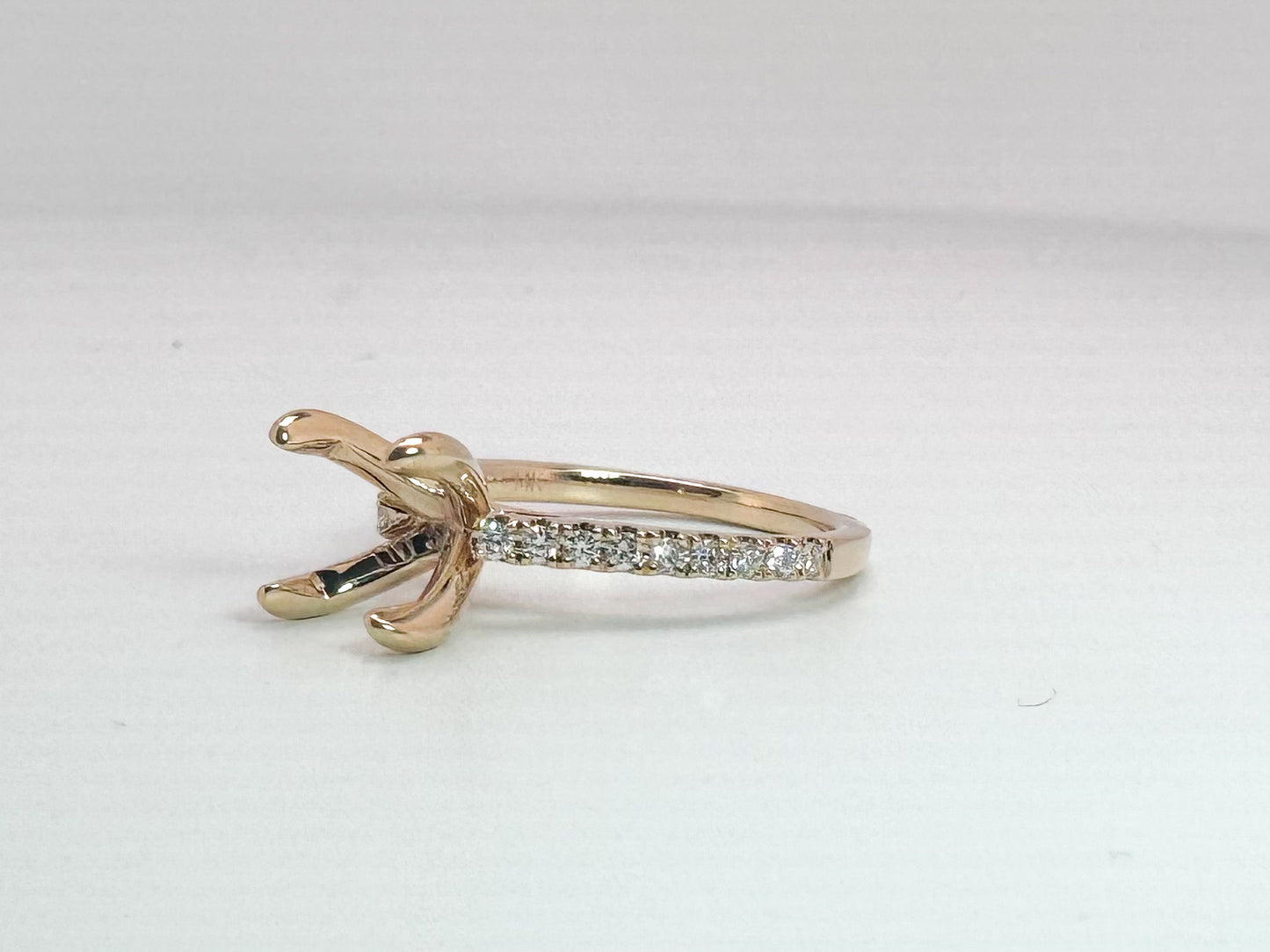 14k, yellow gold .25 natural diamond cathedral semi mount to hold an 8mm round stone