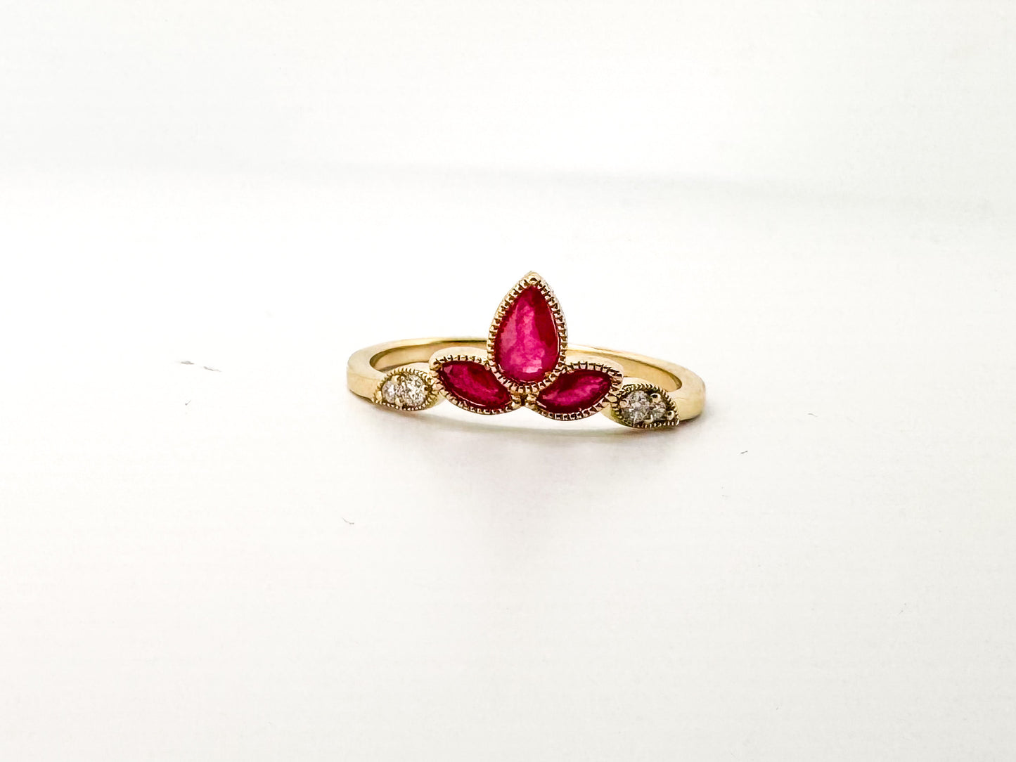 14KY .42 Natural ruby set with .06 carat natural diamond.