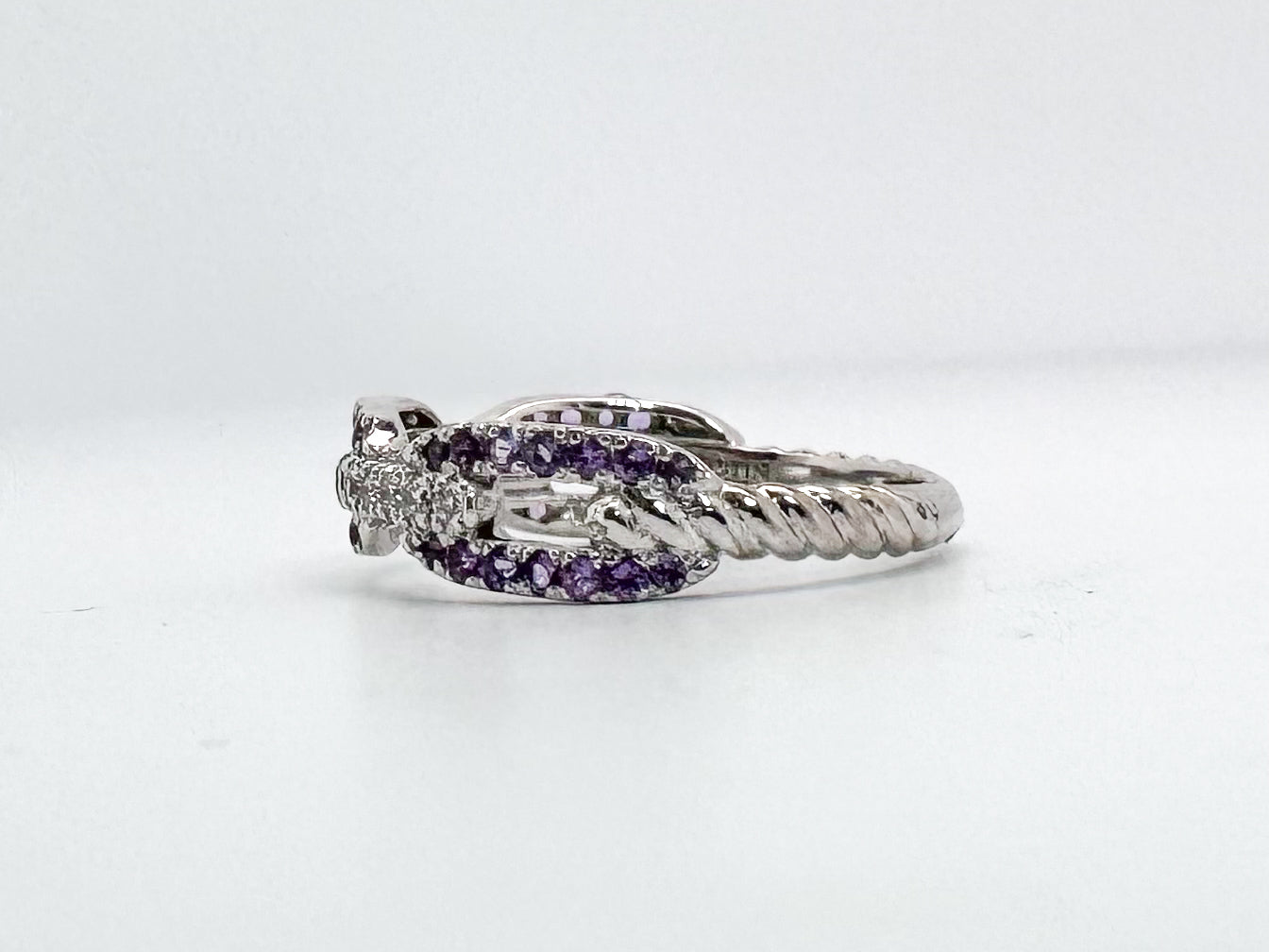 14K, white gold Amethyst and diamond chain ring.