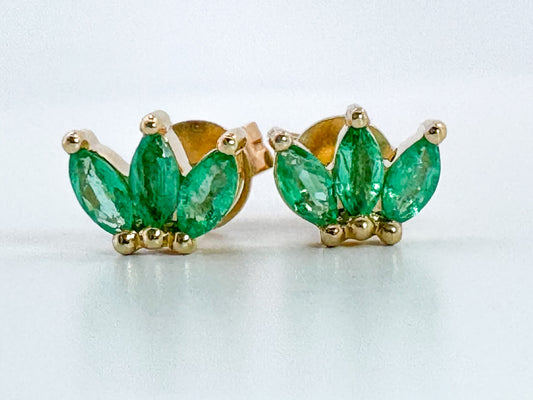 14ky .58 ctw natural emerald earrings.