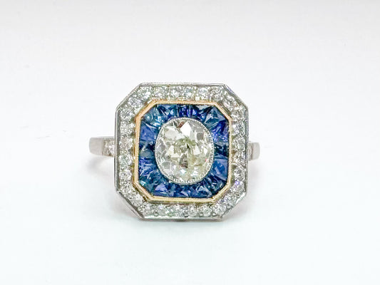 Platinum & 18k vintage 1.00 carat center old mine cushoin cut with 1.90 natural sapphire and .40 ct side diamonds