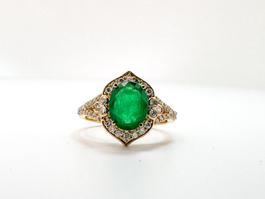 14K, yellow gold, 1.75 carat natural emerald, set with .40 carats of natural side diamonds.