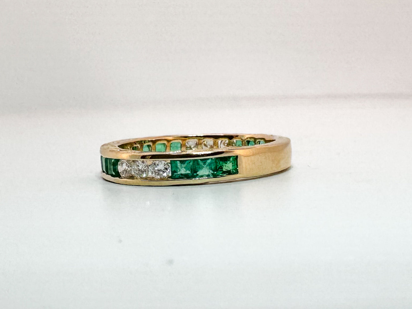 14k, yellow gold, engraved, Natural  Emerald and diamond band.
