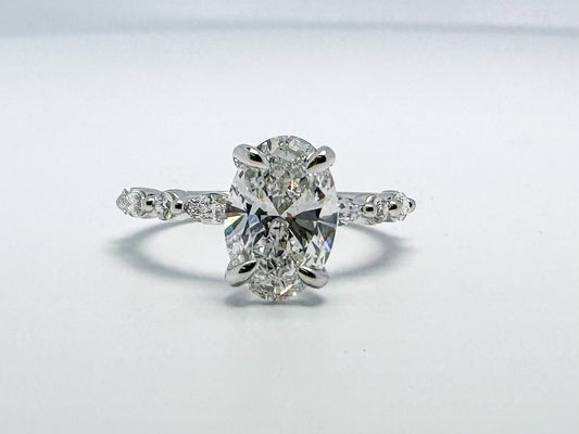 14Kw 2.47 diamond total weight lab grown engagement ring. 2.17 center with .30 side diamond