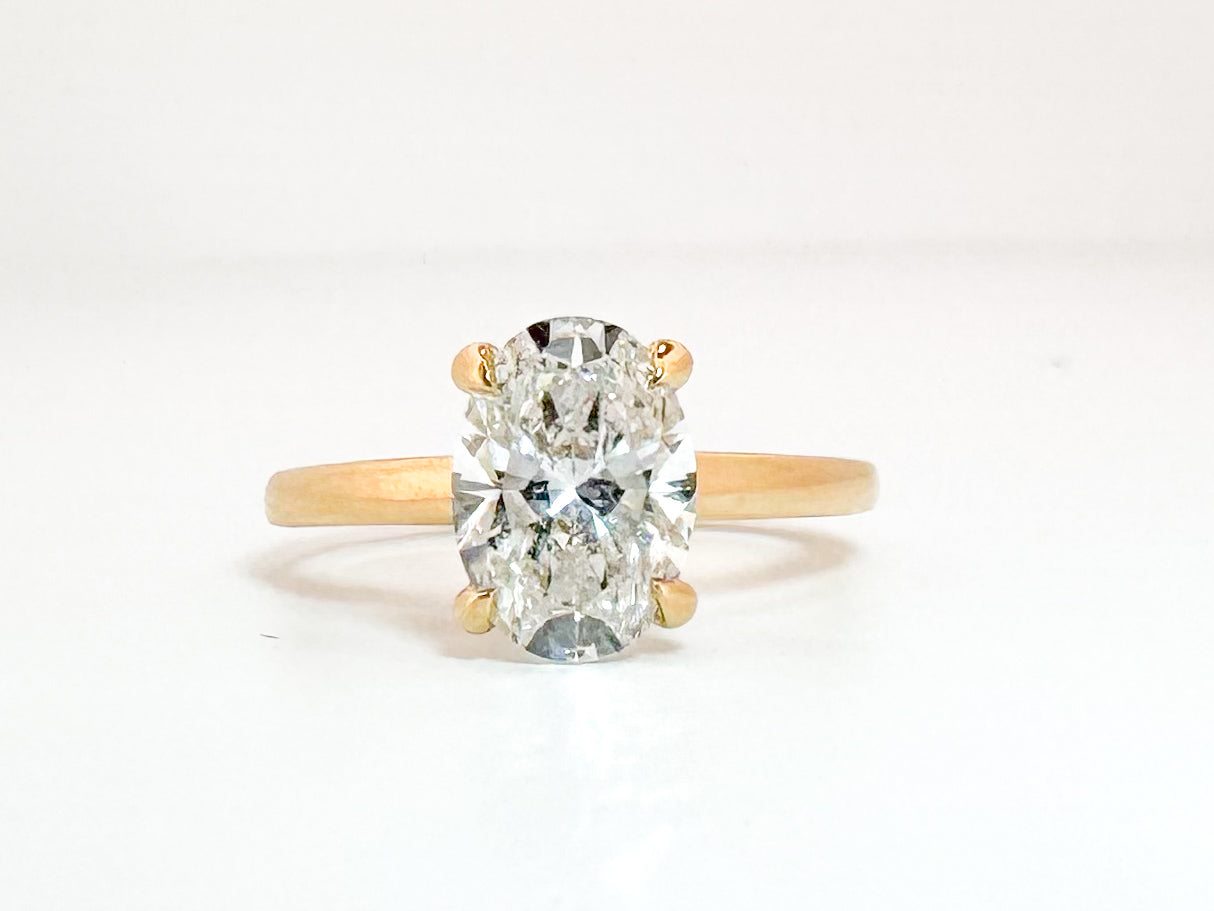14K, Yellow gold, 2.04 carat oval lab diamond engagement ring. VS1 D IGI certified