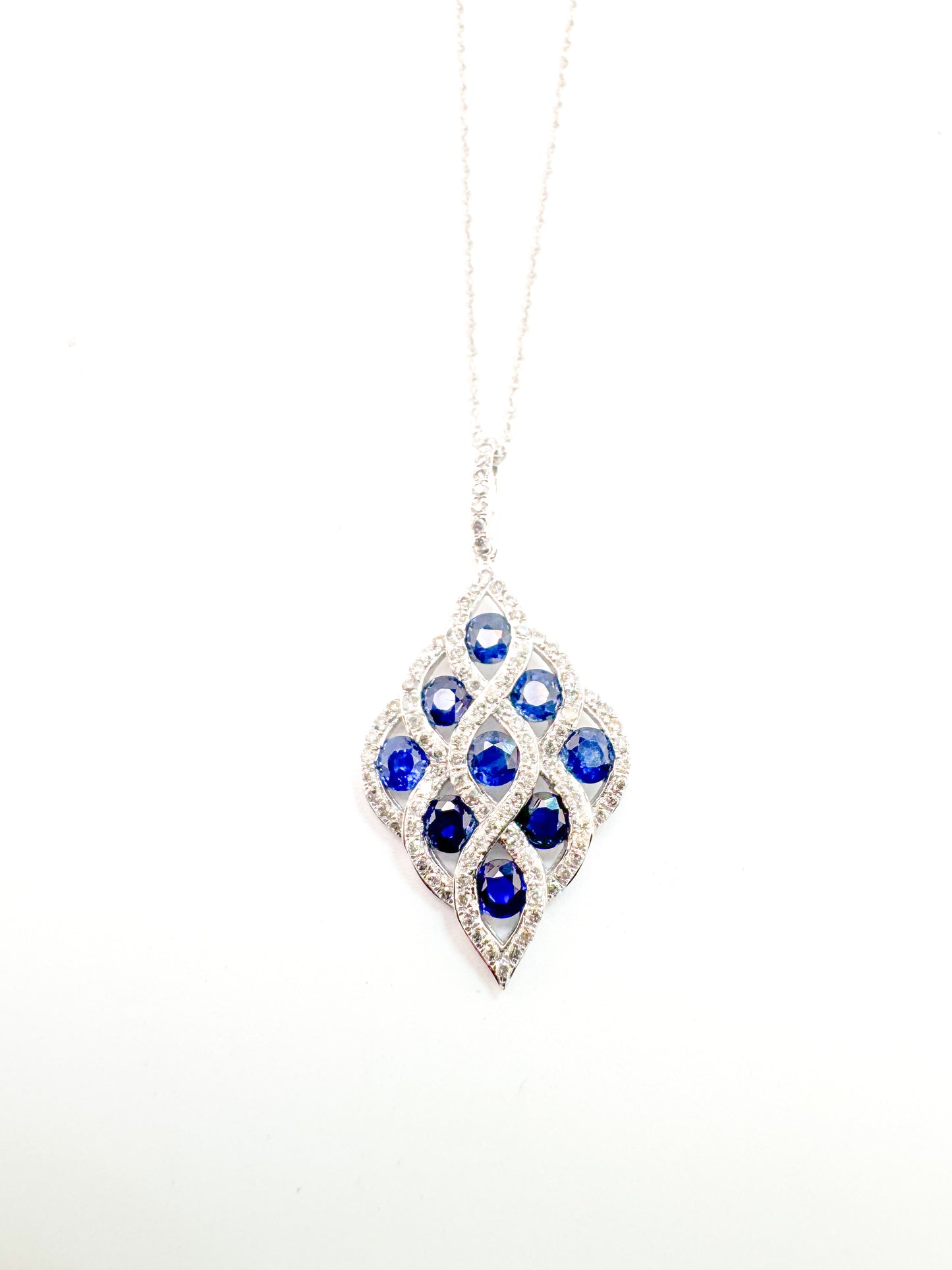 14K, White gold .33 carats of diamonds, 1.00 carat total weight of natural sapphires. necklace