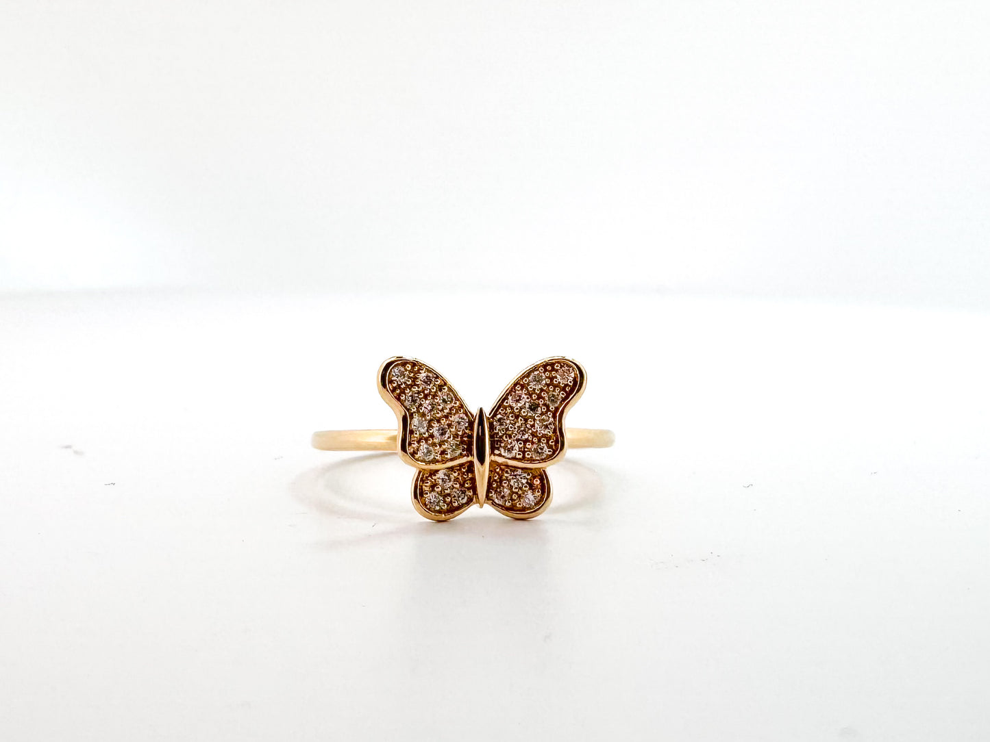 14k, Yellow gold, diamond, butterfly fashion ring. .13 carat total weight.