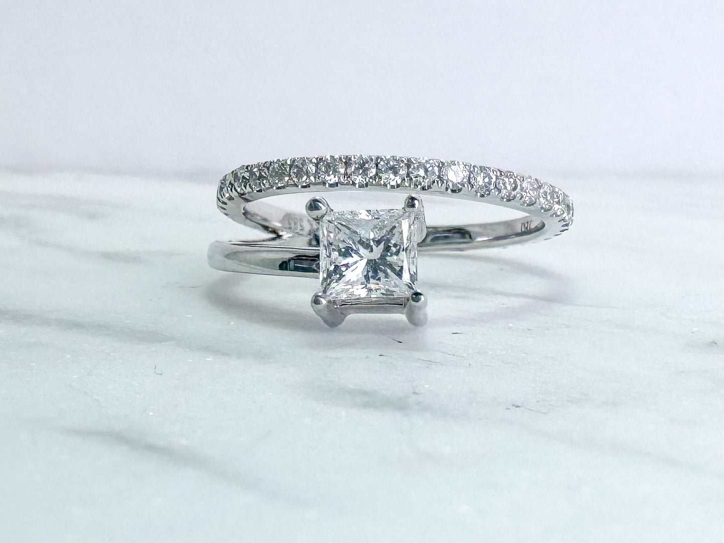 14k white gold, modern princess cut diamond ring.