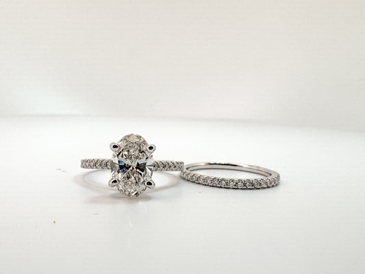 14K, White gold 2.08 VS2 E Lab grown oval set with .44 carats of side diamonds IGI certified