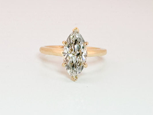 14k, yellow gold 2.24 carat marquise cut lab diamond solitaire. VS2 G IGI certified