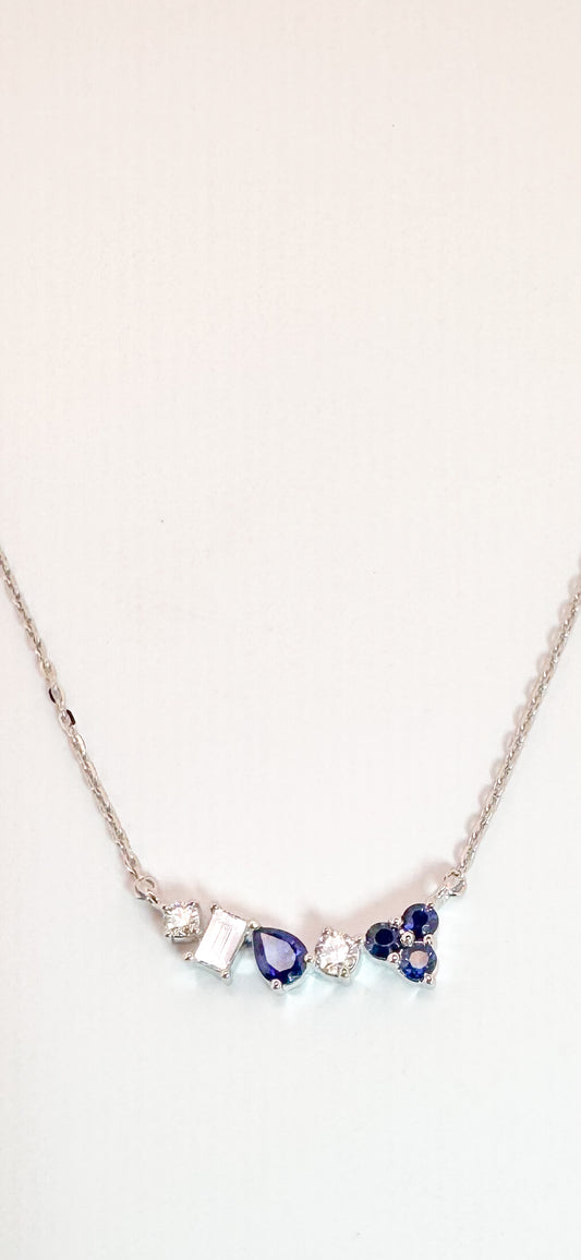 14K, white gold, .18 diamond total weight, .33 carat total weight of natural sapphire. Multi stone necklace