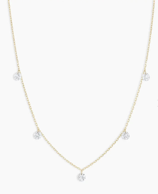 14K,yellow gold (5) floating diamond necklace. .35 natural diamond total weight