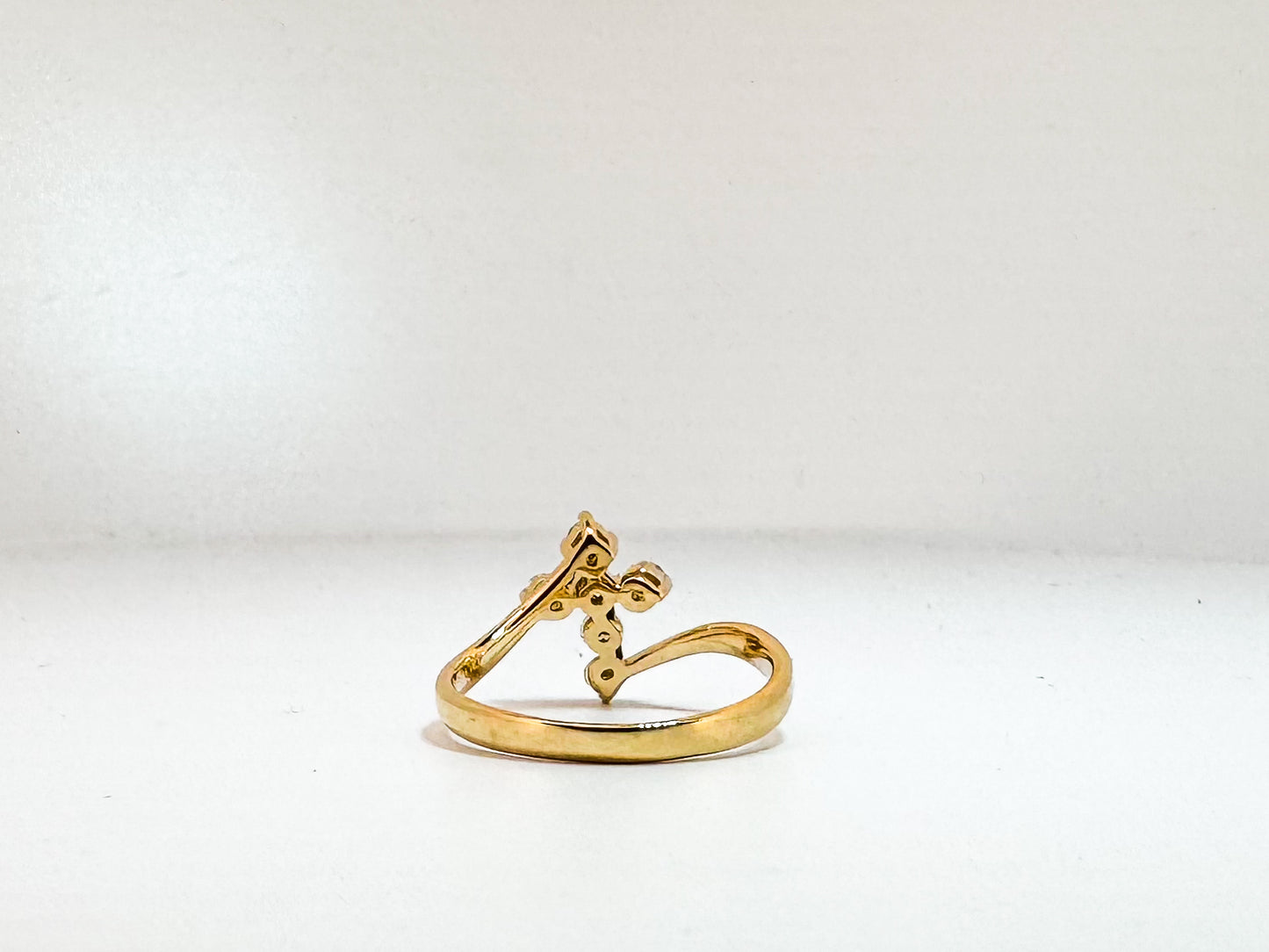 14K, Yellow gold, .43 diamond total weight, natural diamond cross ring.
