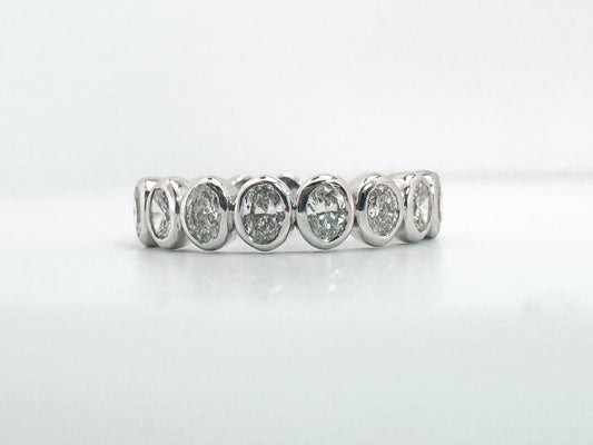 14k, white gold, natural oval diamond band. .97 carats