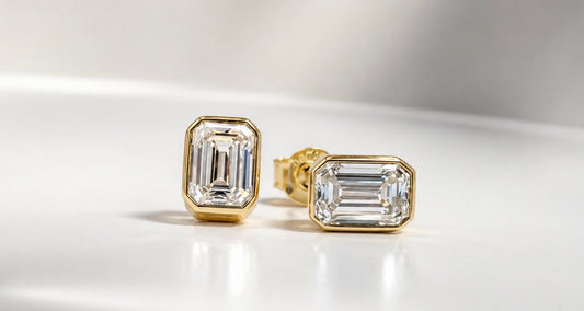 14K, yellow gold , bezel set, lab grown, emerald cut stud earring. 2.22 carat total weight. IGI certified