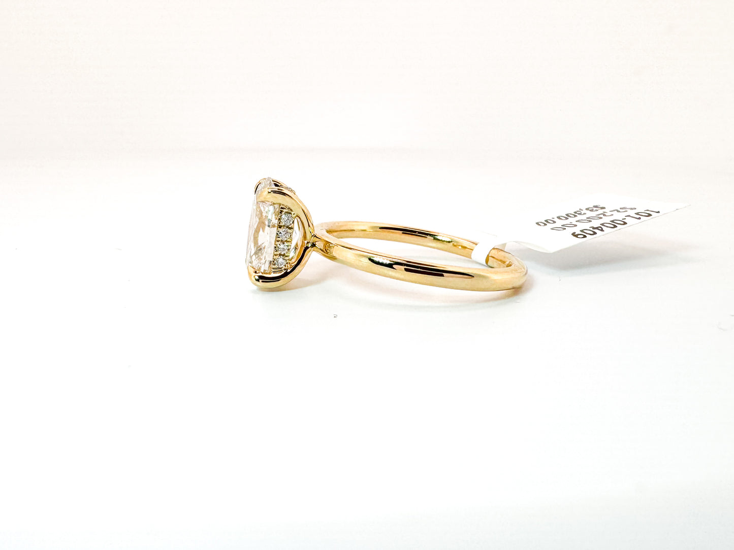 14k, yellow gold 1.89 carat, Lab grown oval set with .06 side dia