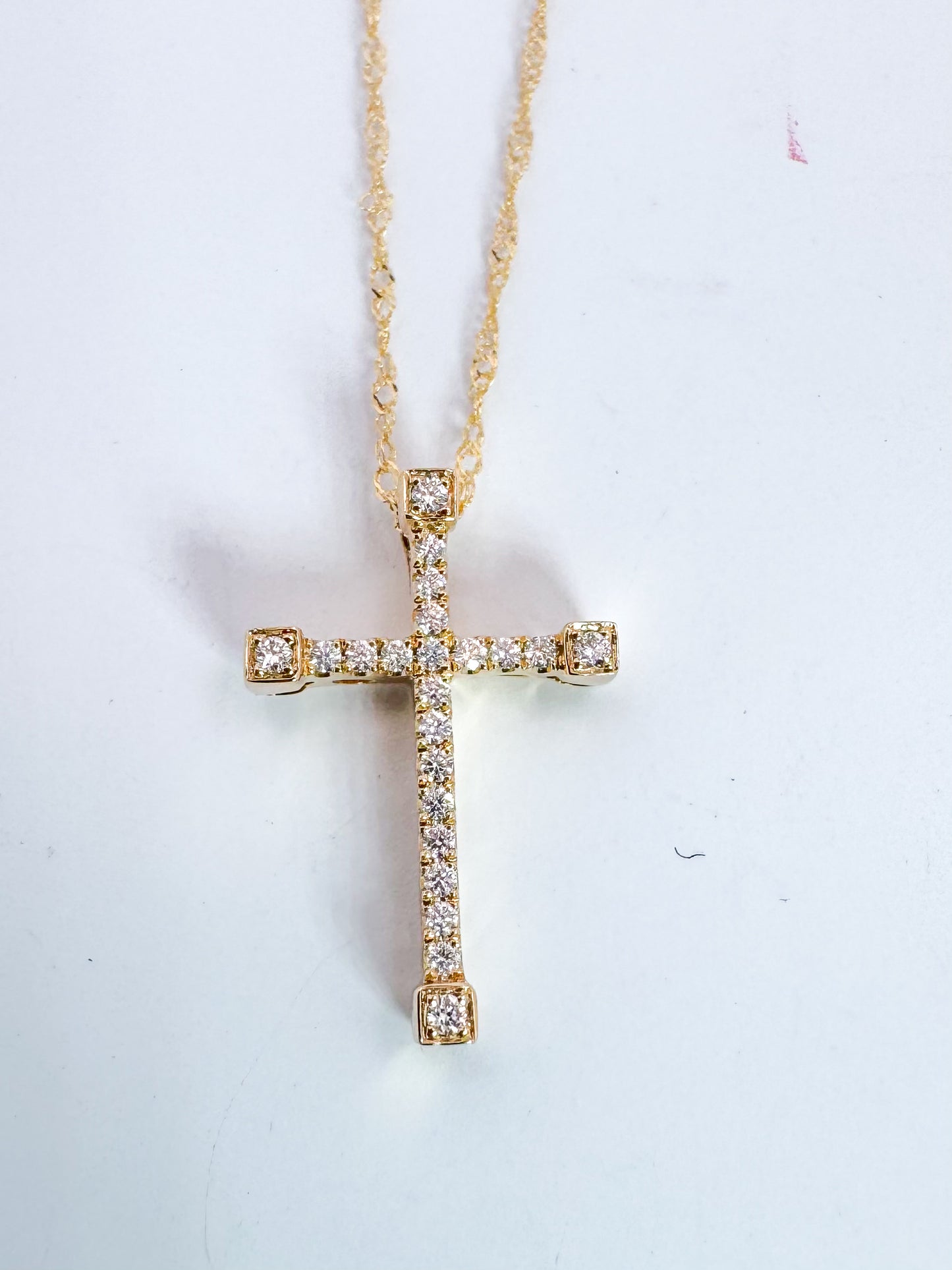 14k, Yellow gold, natural diamond cross.