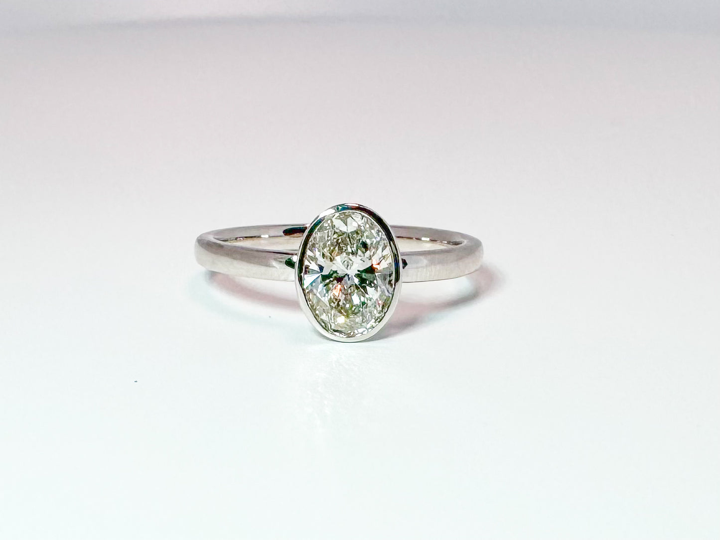 14K, white gold .94 lab grown oval diamond engagemengt ring. VS2 I