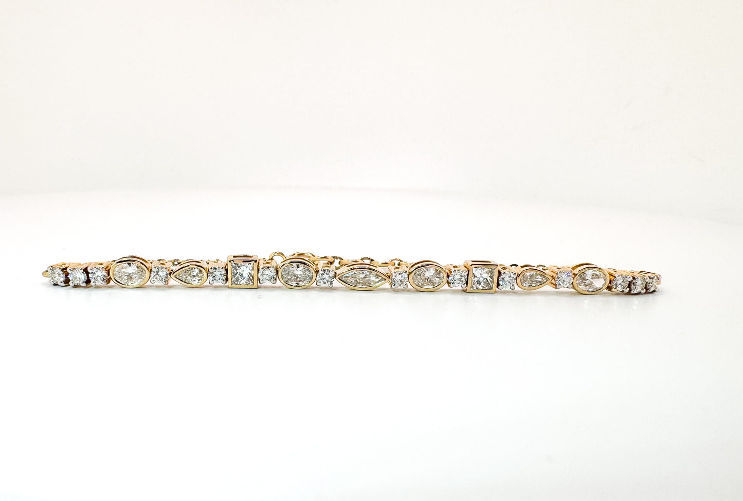 14K, yellow gold, Multi shape, lab grown diamond tennis bracelet. 1.93 carat total weight.