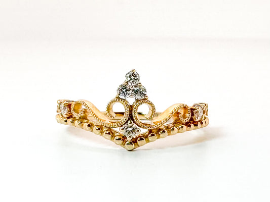 14k, Yellow gold .14 diamond total weight crown ring.