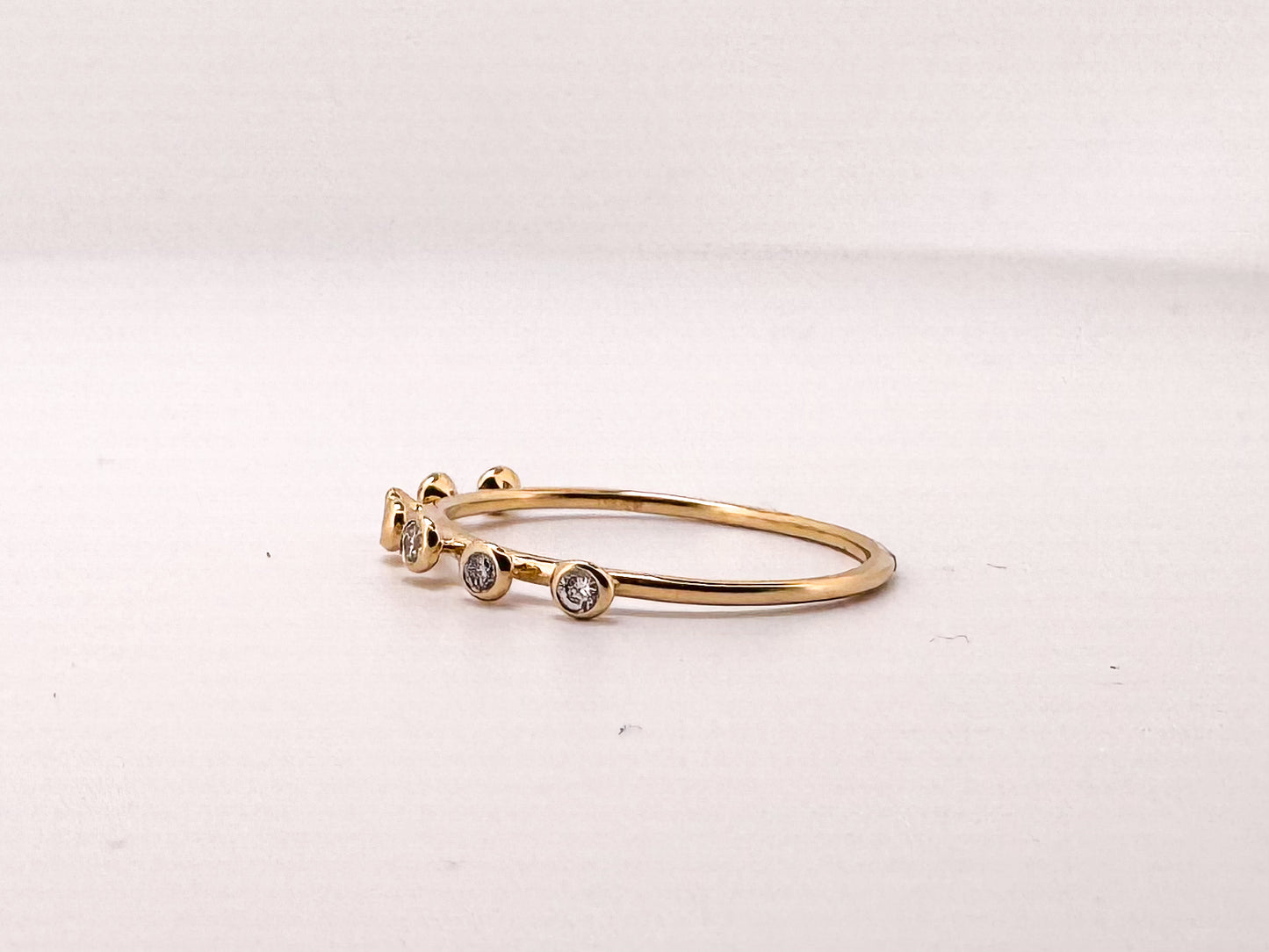 14K, Yellow gold, bezel set diamond wedding or stacker band.