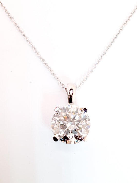 14K, whtie gold 3.10 carat lab grown round brilliant solitaire pendant. VS1 G