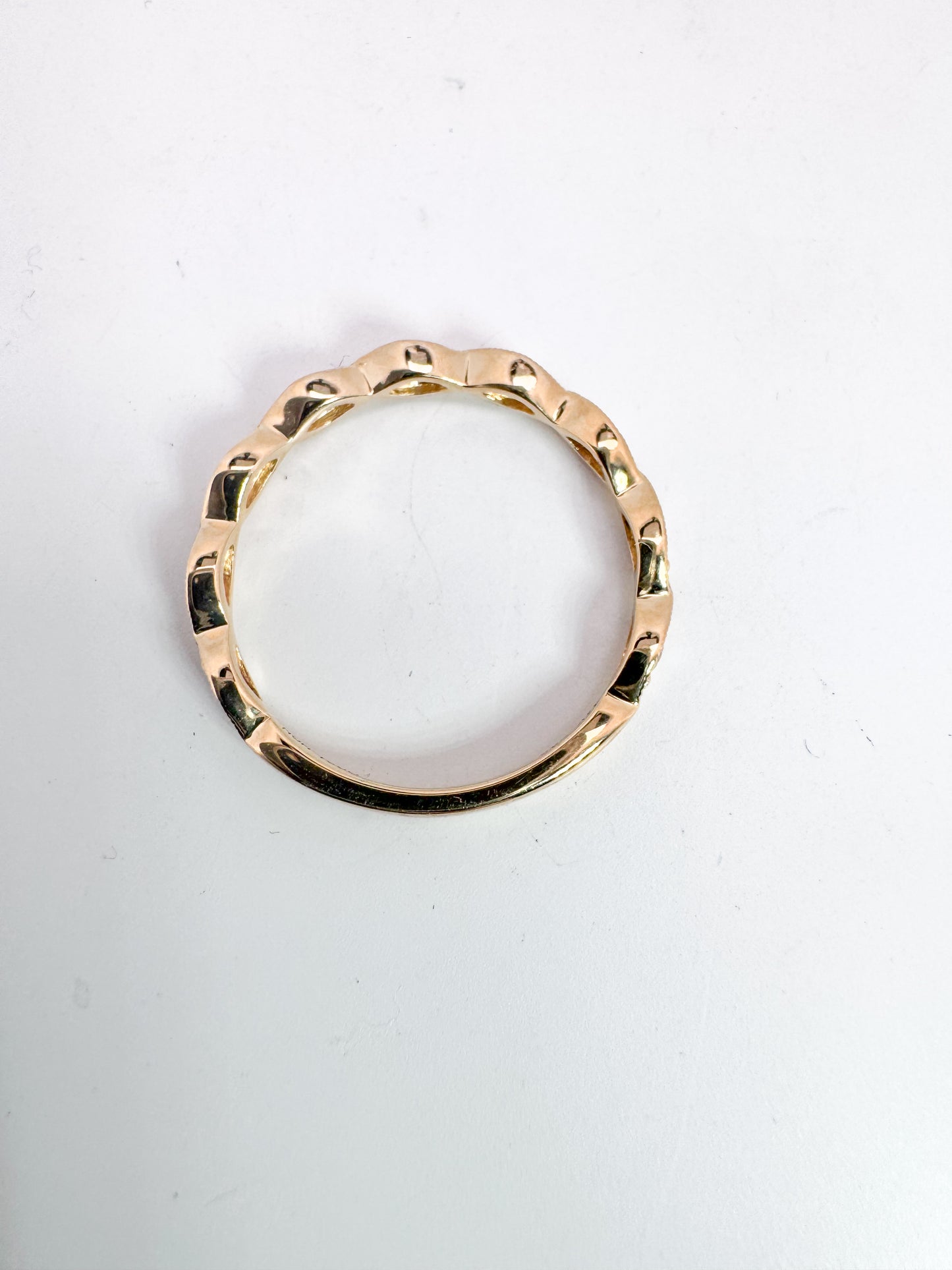 14k, yellow gold scalloped .21 carat, natural diamond band.