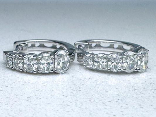 14k, white gold 1.30 diamond total weight earrings.