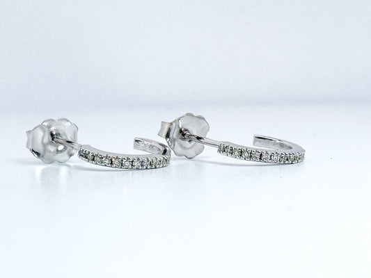 14K, white gold, .10 DTW natural diamond huggie hoop earrings.