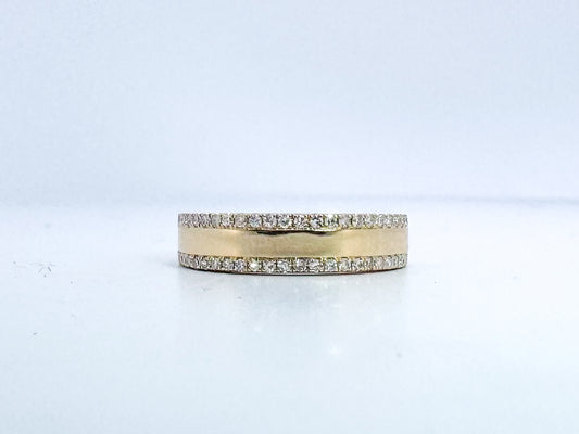 14k, yellow gold .31 diamond total weight double row band.