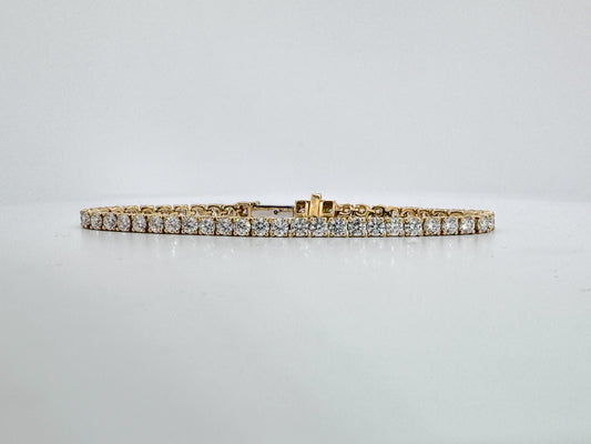 14k, Yellow gold 7.00 carat, lab grown diamond tennis bracelet. VS1/VS2 E-F