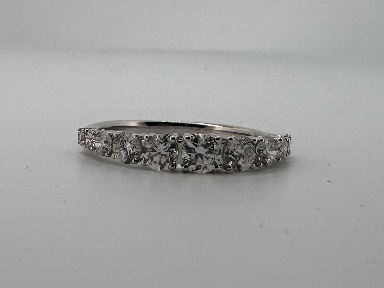 14K, white gold, taperd diamond wedding band. 1.00 carat total weight. Natural diamond