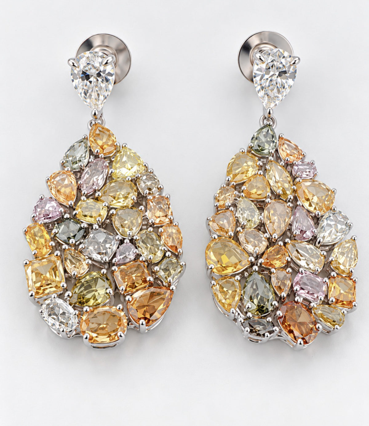 18k, white gold 11.28 carat total weight of natural white and colored diamond earrings.