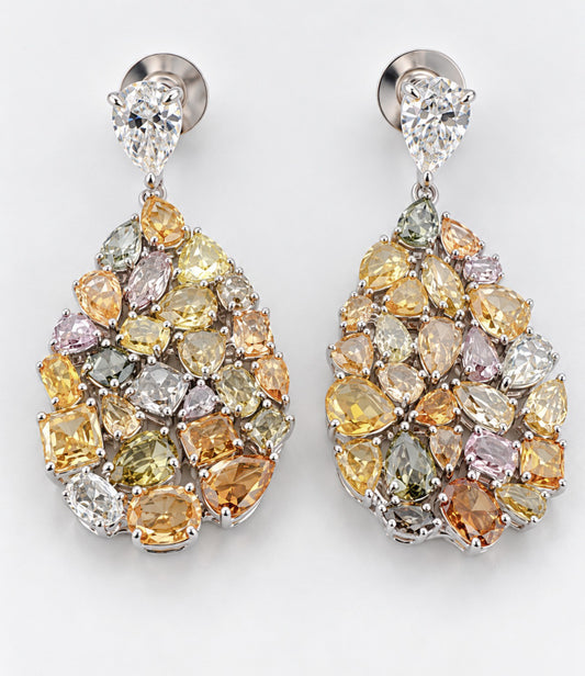 18k, white gold 11.28 carat total weight of natural white and colored diamond earrings.