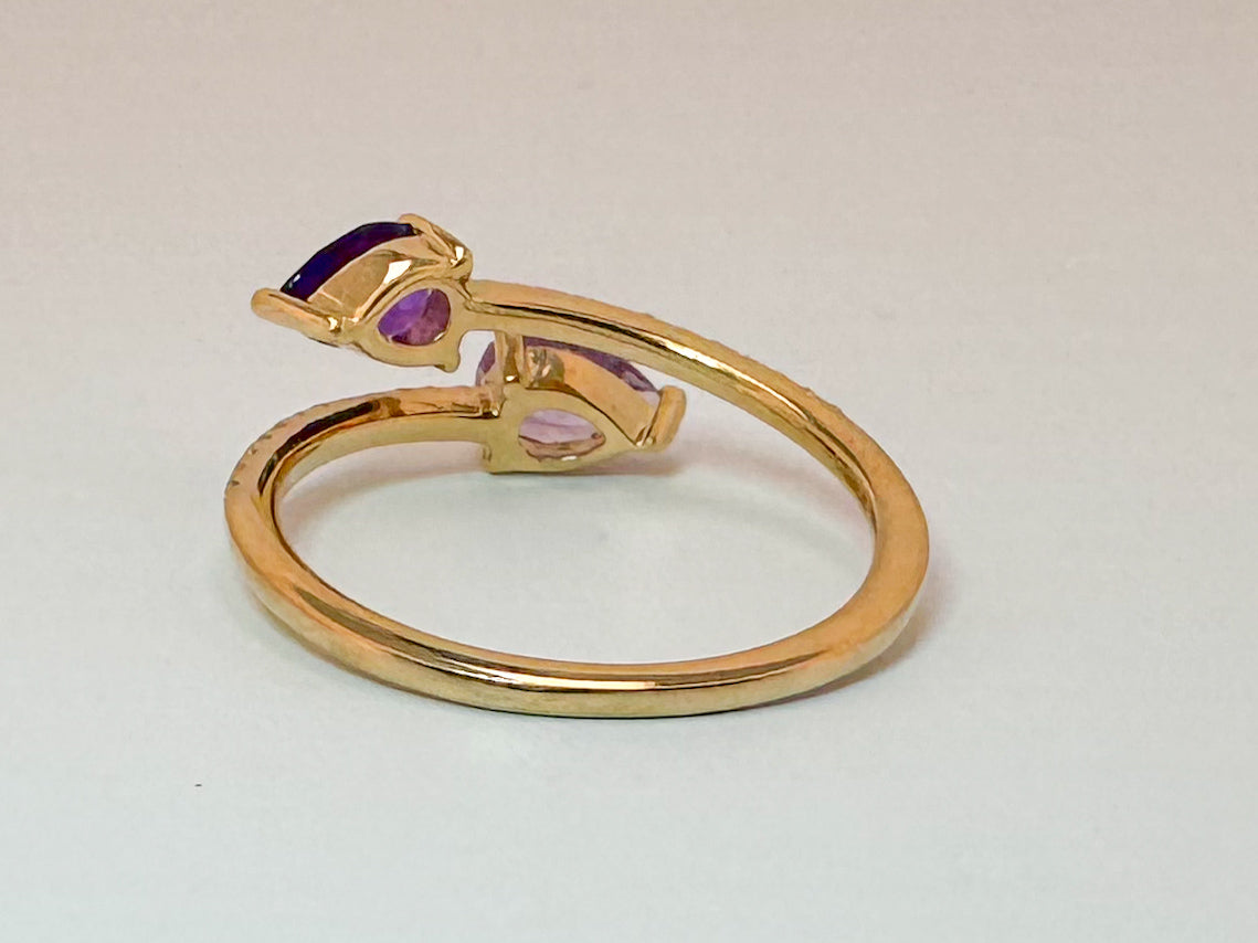 14k, yellow gold, .60 carat total weight Amethyst with .15 diamond total weight side diamond, open concept fashion ring.