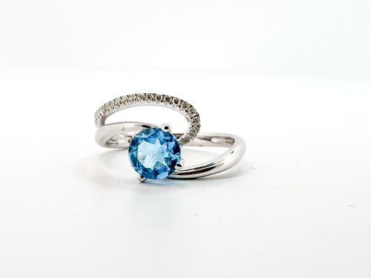 14K, white gold,  1.00 CT Blue topaz with .10 side diamonds fashion ring.