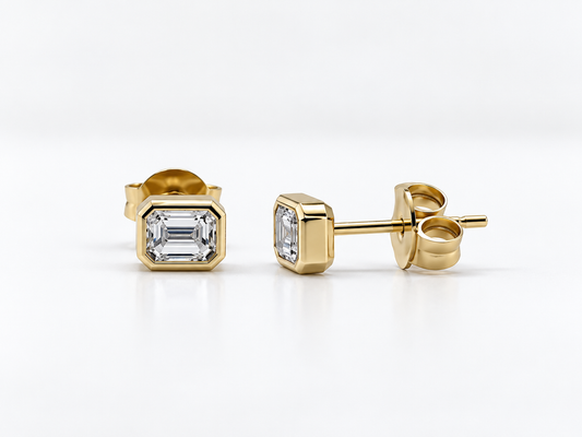 14k, Yellow gold, 1/2 carat total weight, emerald cut, lab grown earrings. Bezel set.
