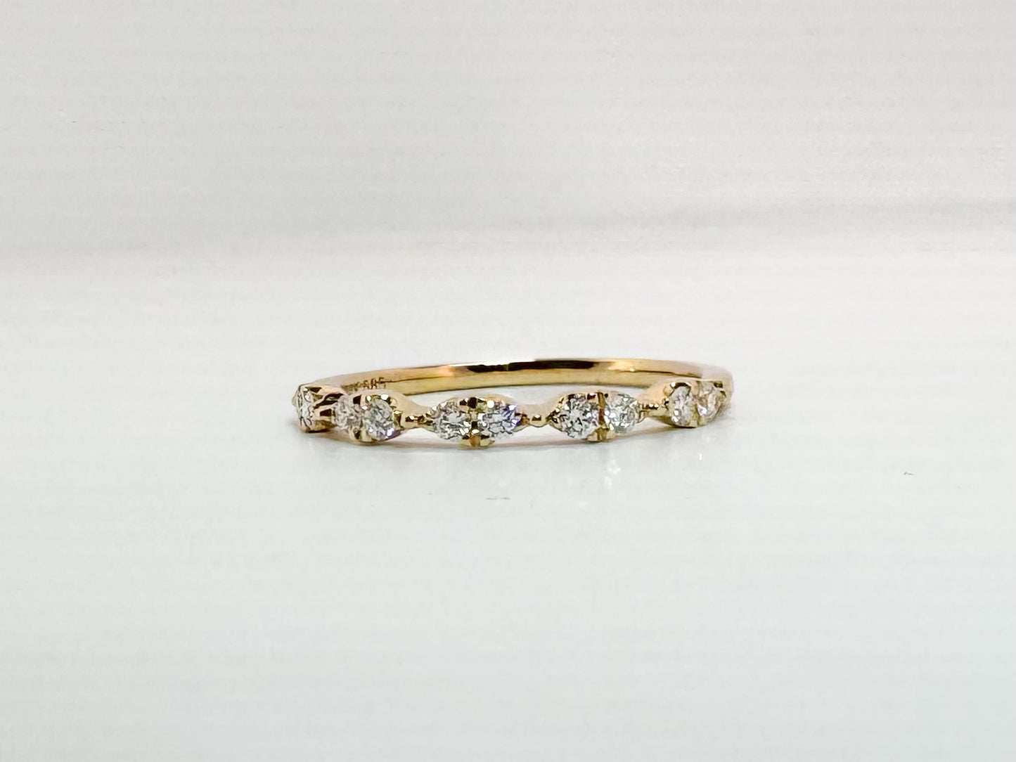 14k, yellow gold, .21 carats of natural diamnds. Wedding band.