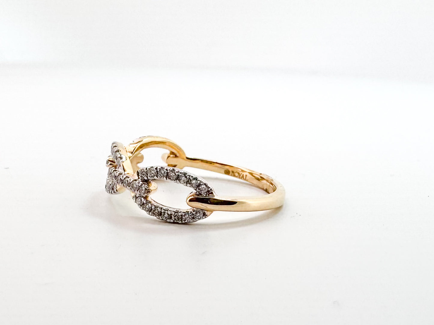 14K, yellow gold, diamond link ring. .24 diamond total weight