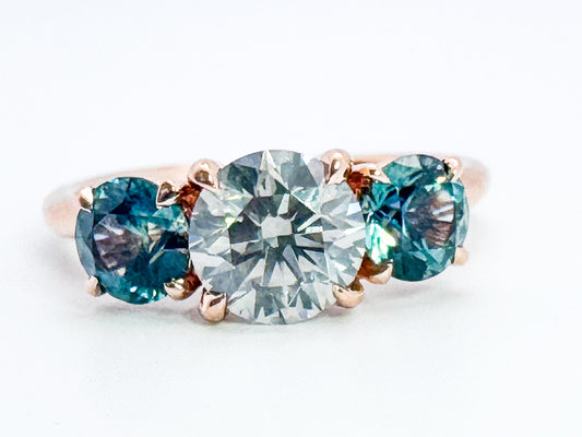 14k, rose gold, 1.02 carat Natural grey diamond set with 1.00 carat total weight natural montana sapphires.