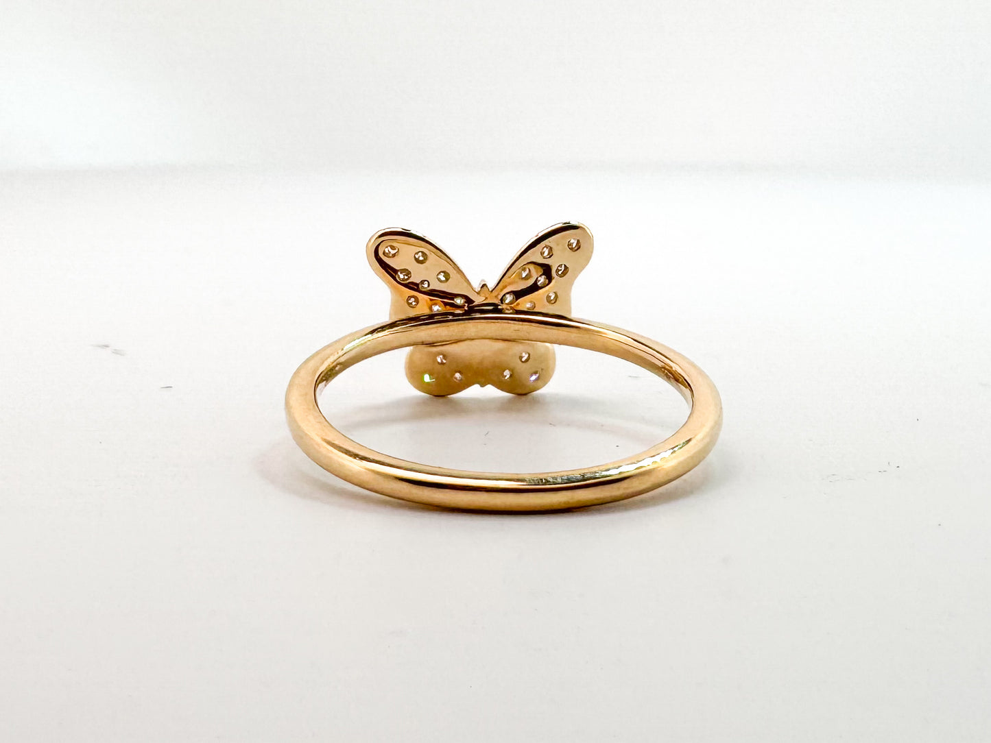 14k, Yellow gold, diamond, butterfly fashion ring. .13 carat total weight.