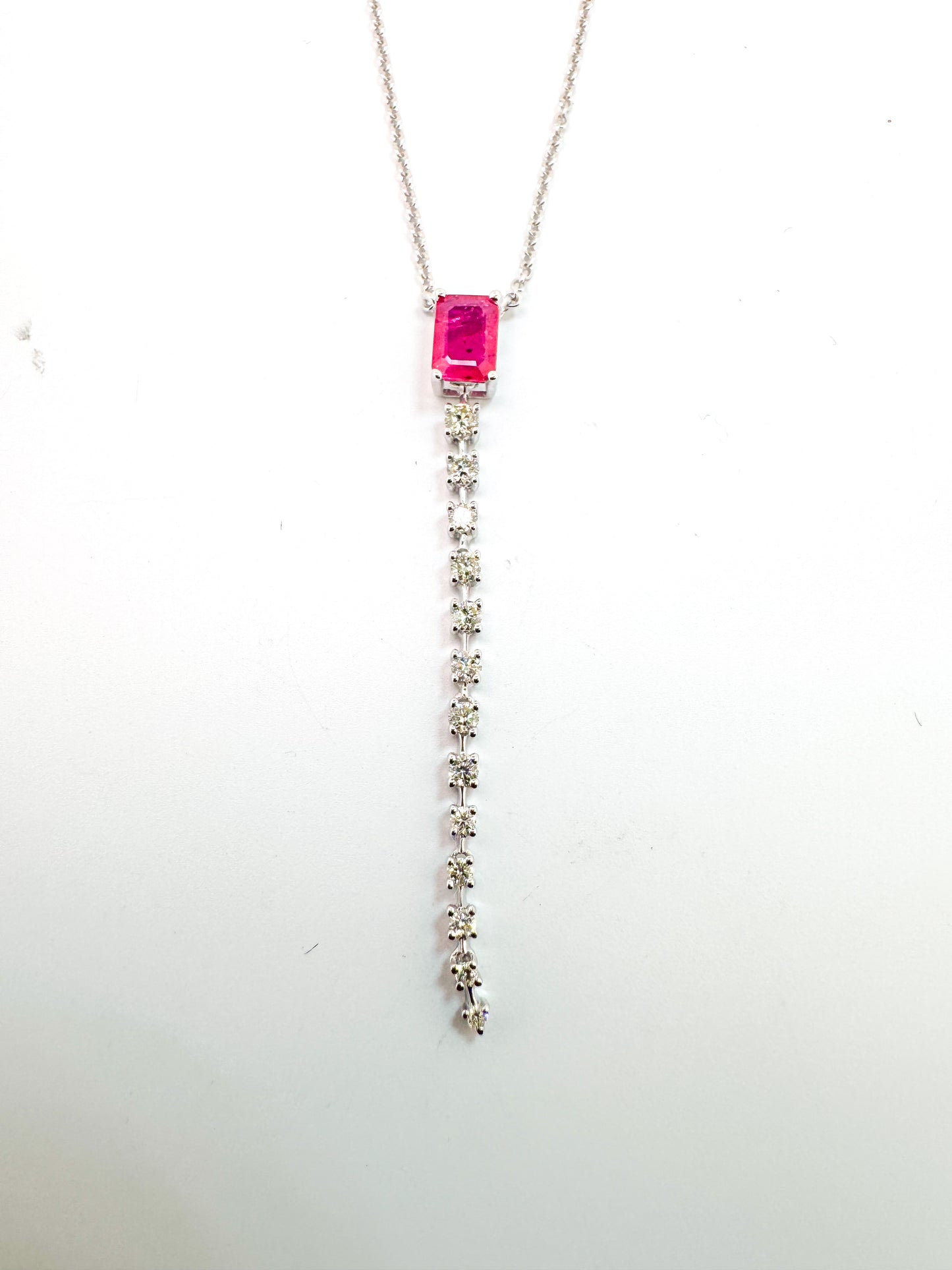 14K, white gold, .60 carat ruby with .27 carats of natural diamonds. Necklacew