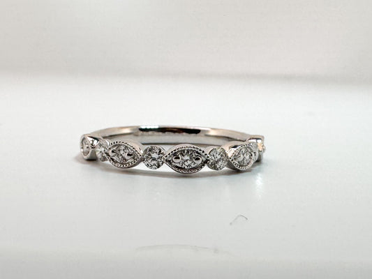 14K, White gold, .35 diamond total weight, scalloped band.