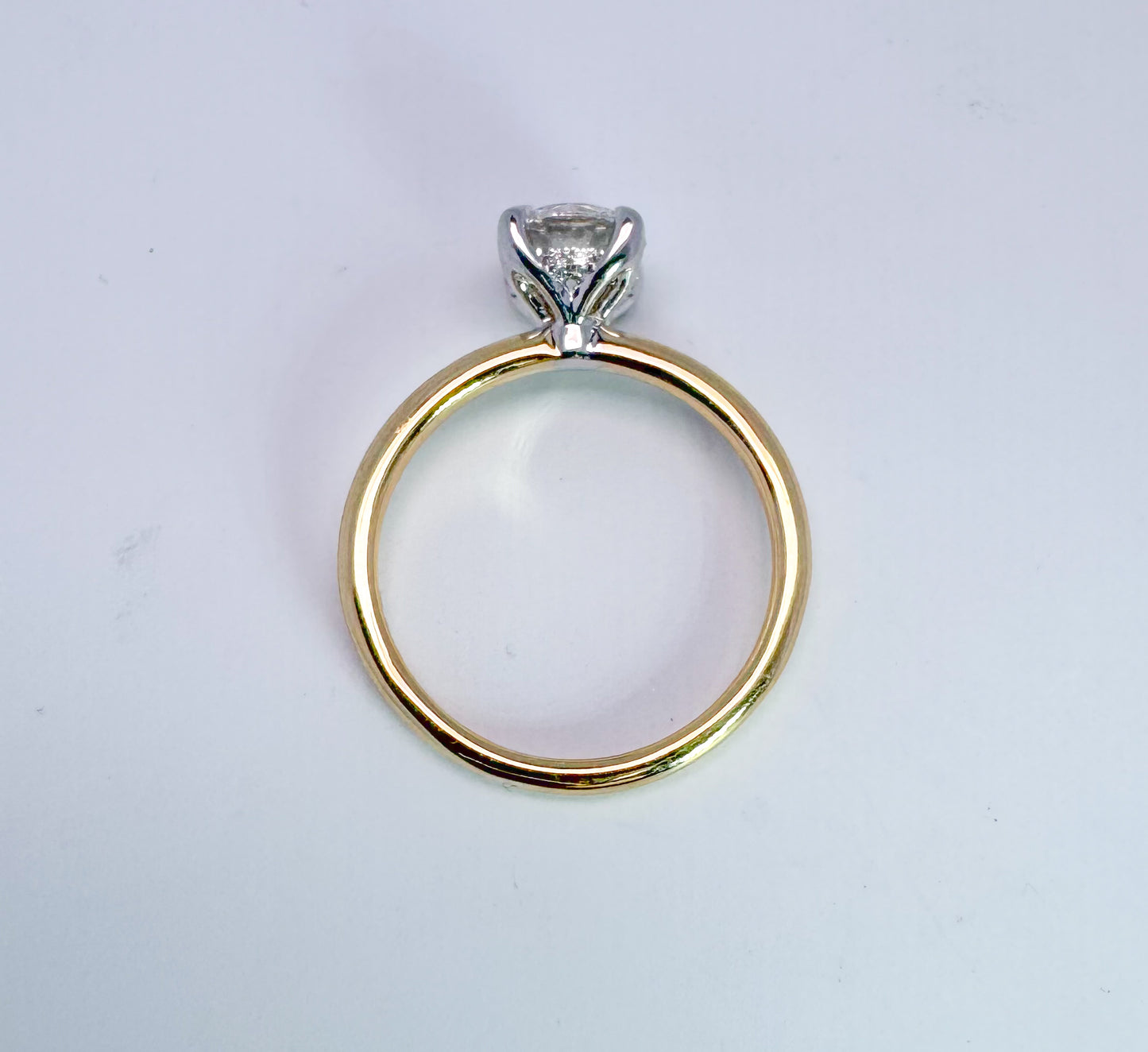 14k two tone 1.21 ideal cut round brilliant, F SI1, set in solitaire with hidden halo