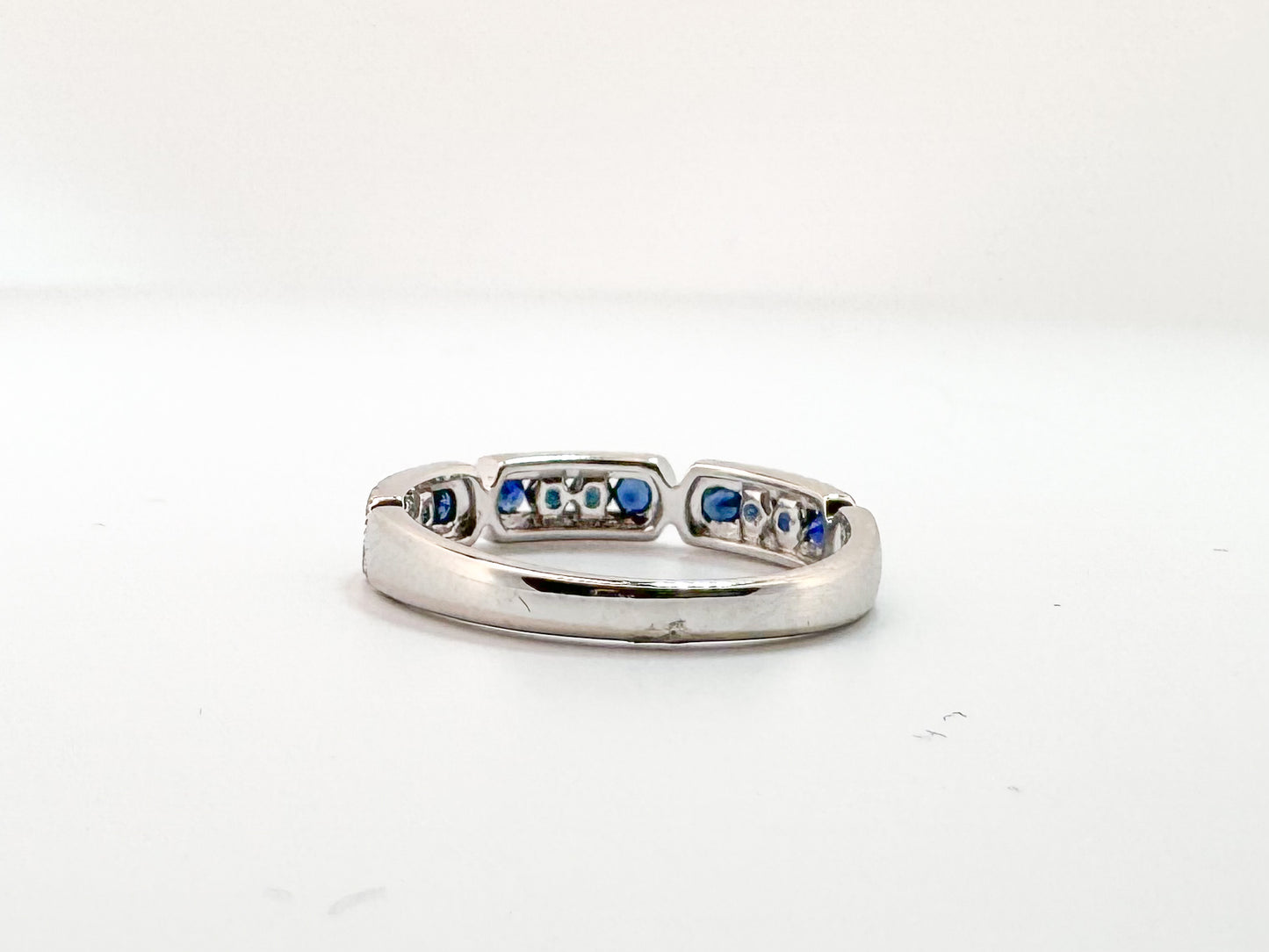 14k, White gold, .20 diamond total weight, .42 sapphire total weight.