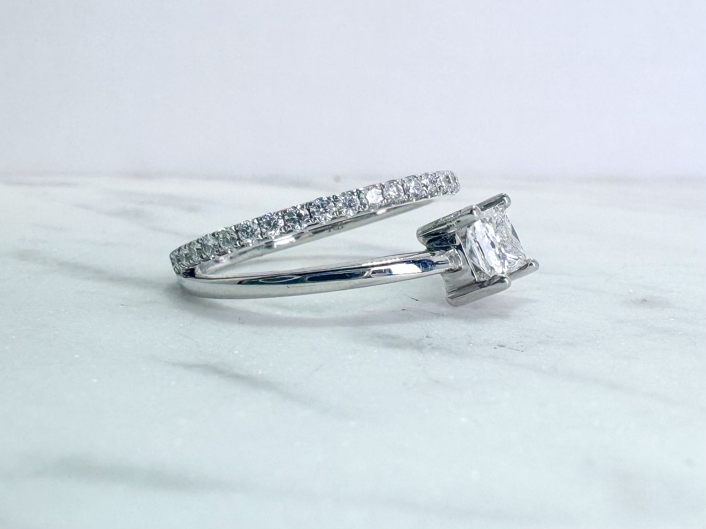 14k white gold, modern princess cut diamond ring.