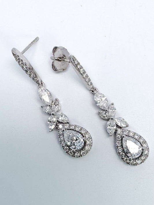 14kw 2.00 ctw lab diamond dangle earrings.
