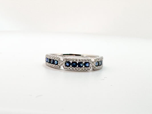 14k, White gold, .20 diamond total weight, .42 sapphire total weight.